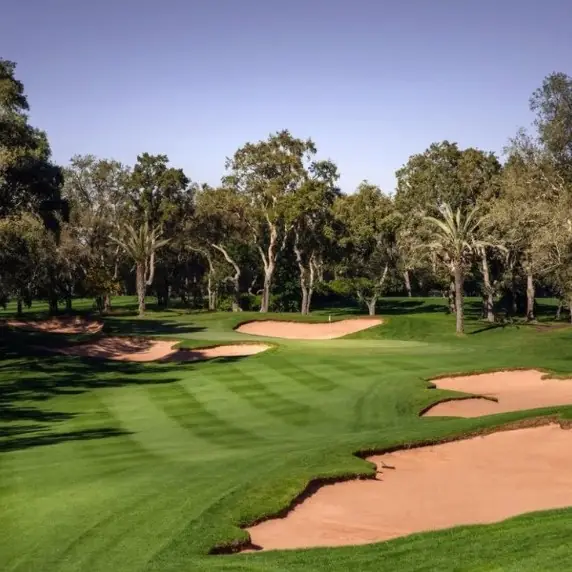 Fairway lined with trees and bunkers, Rabat
