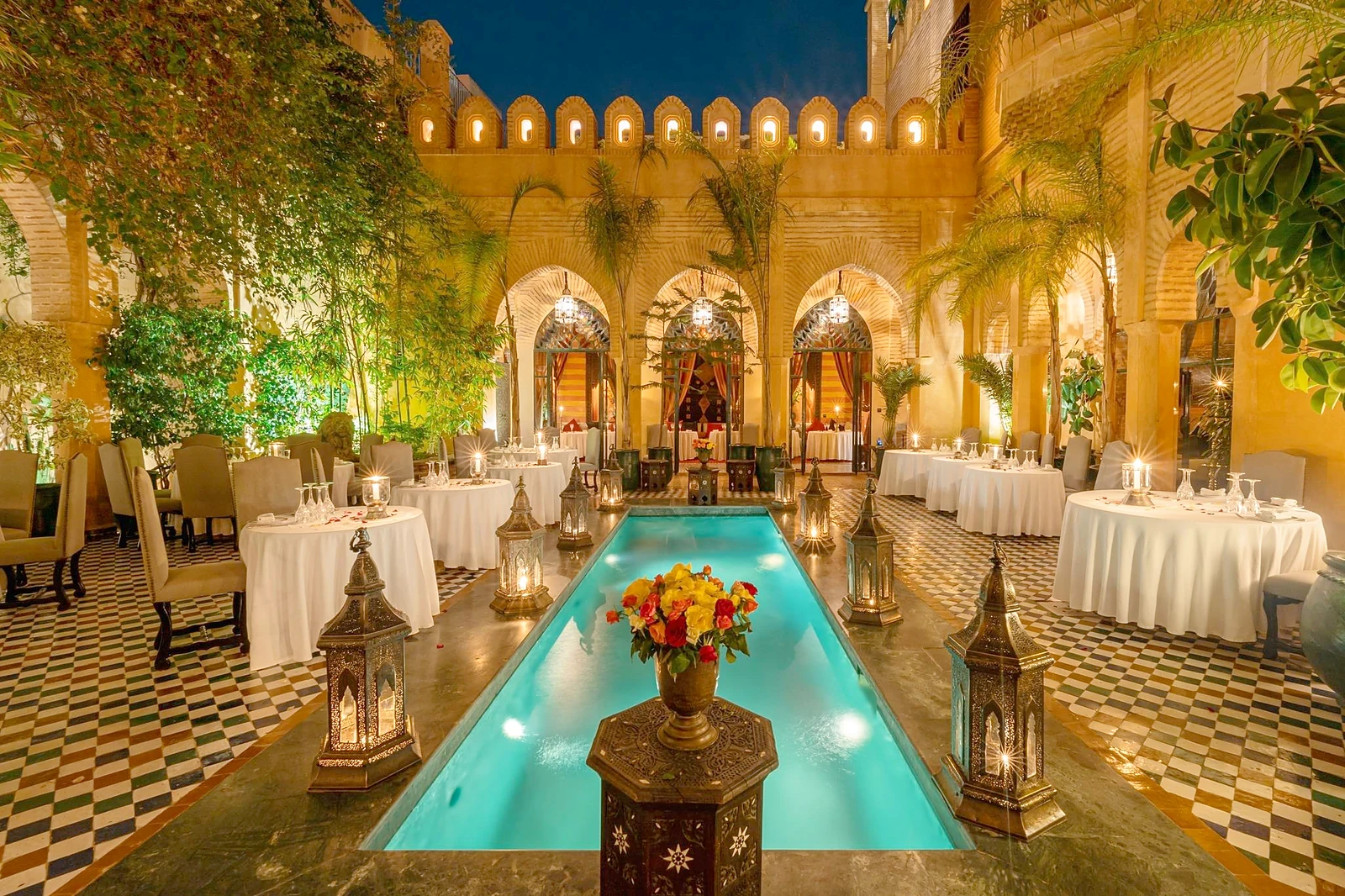 Illuminated riad patio with pool, Dar Yacout in Marrakech