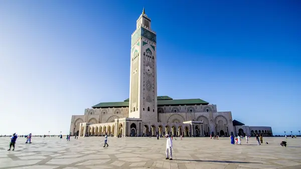 Hassan II mosque and its minaret under a blue sky, Casablanca